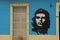 Art of Che Guevara on a blue colonial style house along a street at Trinidad, Cuba