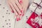 Art christmas manicure, red and white color