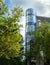 Art Deco building seen through trees