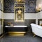 Art Deco Extravaganza: A glamorous bathroom with black and gold accents, geometric tiles, and a freestanding clawfoot bathtub5,