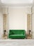 Art deco style beige interior with green sofa, columns, table lamp, moldings.