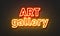 Art gallery neon sign on brick wall background.