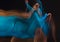 The art photo-emotional dance of beautiful blue woman