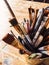 Art tools in artist studio, paint brushes and oil palette, creative hobby and artistic workspace