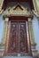 Art wood work door stupa wat samien nari temple in bangkok thailand