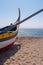 Arte Xavega typical portuguese old fishing boat on the beach in Paramos Espinho Portugal