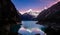 Artesonraju mountain reflected on lake paron