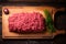 Artful composition top view of uncooked minced beef on wood