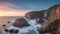 An Artful Depiction Of A Picturesque Rocky Coastline With A Sunset AI Generative
