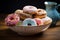 Artfully glazed ceramic pot holds a tempting assortment of delicious donuts