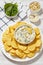 artichoke spinach almond dip with potato chips