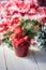 Artifical poinsettia - christmas symbol in red flower pot.