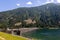 Artificial alpine reservoir lake Zoccolo and mountain range at Ultental, South Tyrol Italy