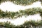 Artificial fir branch garland with tinsel