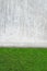 Artificial grass on a cement wall