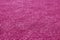 Artificial grass football field loan with blur effect in pink tone