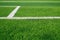 Artificial grass of football field with white stripe, Soccer corner line detail