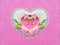 Artificial heart shape of pink rose flower paper on pink color background.