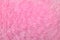 Artificial pink fur background