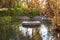 Artificial pond in a city park trees in concrete flowerbeds calm scene