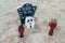 Artificial scary grave with tombstone decoration on the beach during Halloween