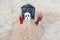 Artificial scary tombstone with skeleton decoration on the beach during Halloween