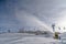 Artificial snow from snow cannon on a ski resort