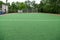 Artificial turf is a surface manufactured from synthetic fibers made to look like natural grass on football field