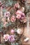 Artificial vintage flowers, leaf background for decor. Beautiful florals retro texture, pastel colors