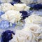 Artificial white and blue roses