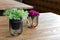 Artificial wood flowerpot on wooden table, small light brown colour in room