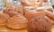 Artisan baked, variety of breads at a farmers market