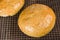 Artisan rosemary bread on cooling rack