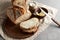 Artisan sliced toast bread with butter and sugar on wooden cutting board