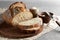 Artisan sliced toast bread with butter and sugar on wooden cutting board. Simple breakfast on grey concrete background