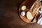 Artisan sourdough sliced toast bread with butter and pink himalayan salt on cutting board