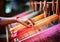 Artisan working on a manual loom. Traditional crafts. Handmade. AI generated