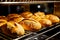 Artisanal bread loafs in cooling rack at bakery. Close-up