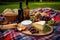 artisanal cheese platter and wine bottle on a picnic blanket