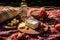 artisanal cheese platter and wine bottle on a picnic blanket