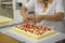 artisanal preparation of pastry desserts with strawberries