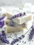 artisanal soap bars featuring lavender blooms, harmonizing with a rustic white wood