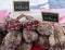 Artisanal specialty sausages coppa, saucisson for sale at a market