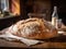 Artisanal Warmth: Fresh Loaf of Bread Basking in Natural Light on Antique Table