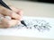 Artist desk top view pen, pencil mandala flower floral hand drawing