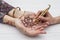 Artist making mehndi womans palms. High quality and resolution beautiful photo concept