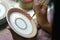 Artist painting benjarong ceramic ware