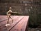 Artist`s Articulating Wood Drawing Mannequin on Wooden Deck