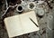 Artist\'s morning with notebook , coffee and cigarettes