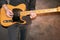 Artist with a Telecaster natural electric guitar